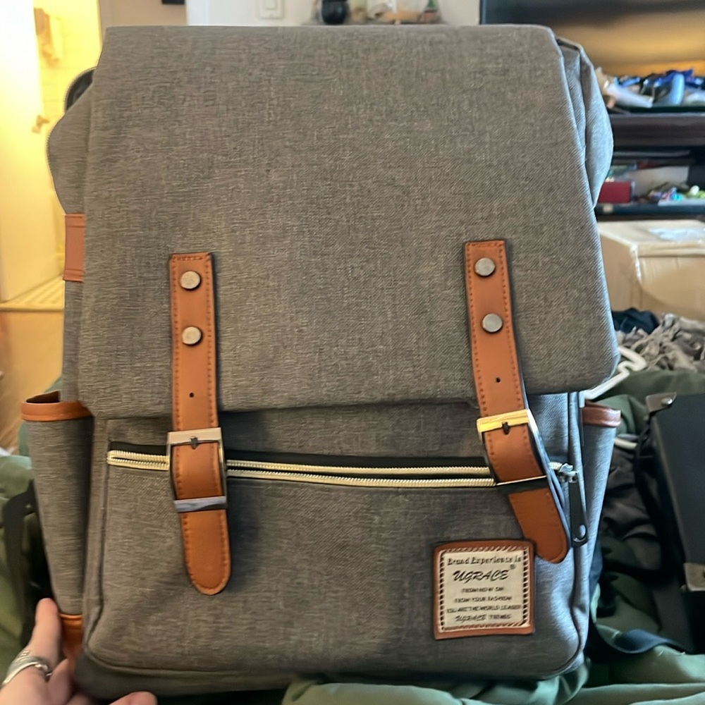 Travel Backpack with USB Slip Through